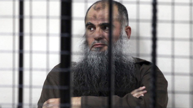 Abu Qatada behind the bars in Amman, Jordan