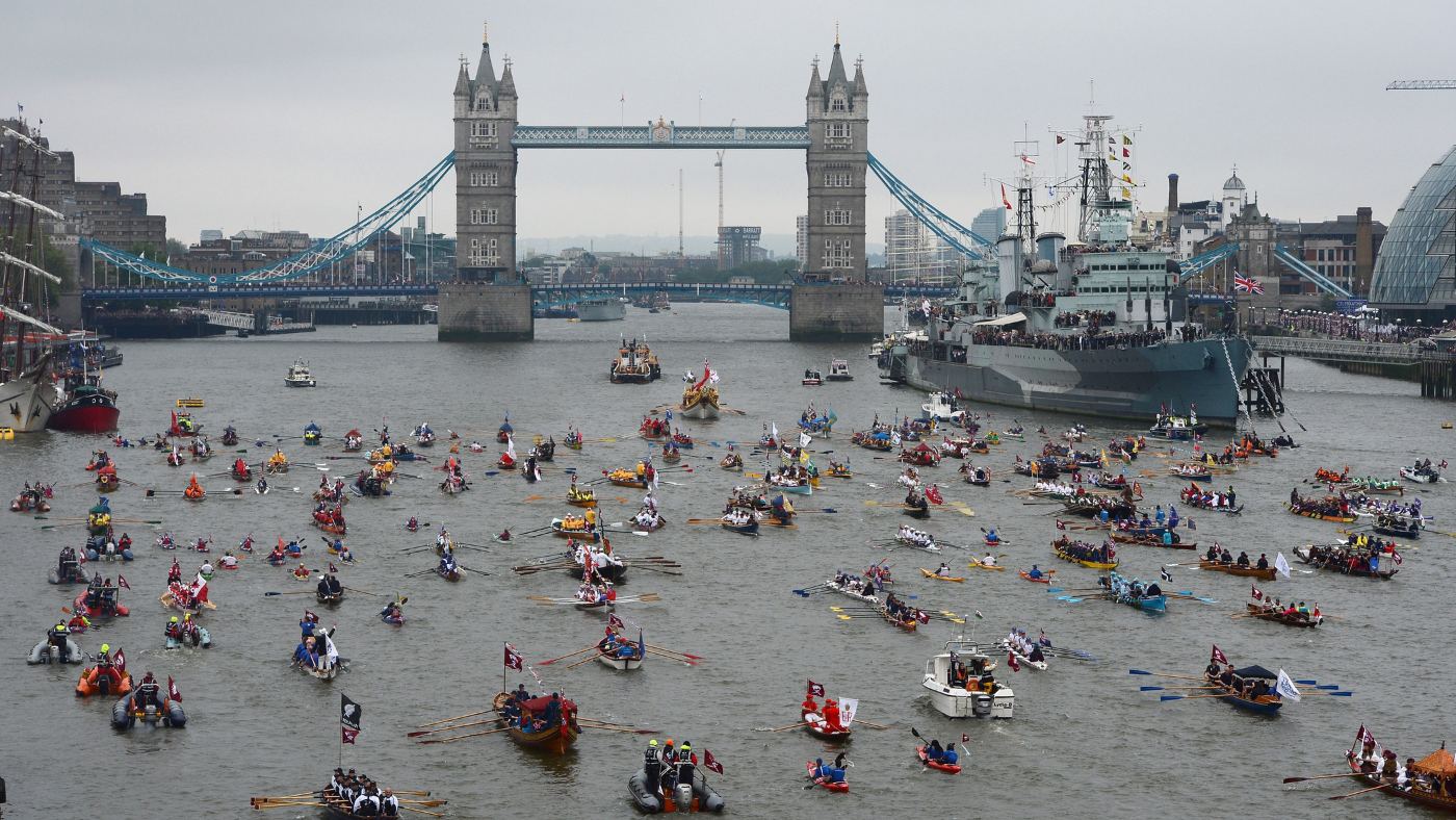 Boats sail down the Thames during Diamond Jubilee Pageant 