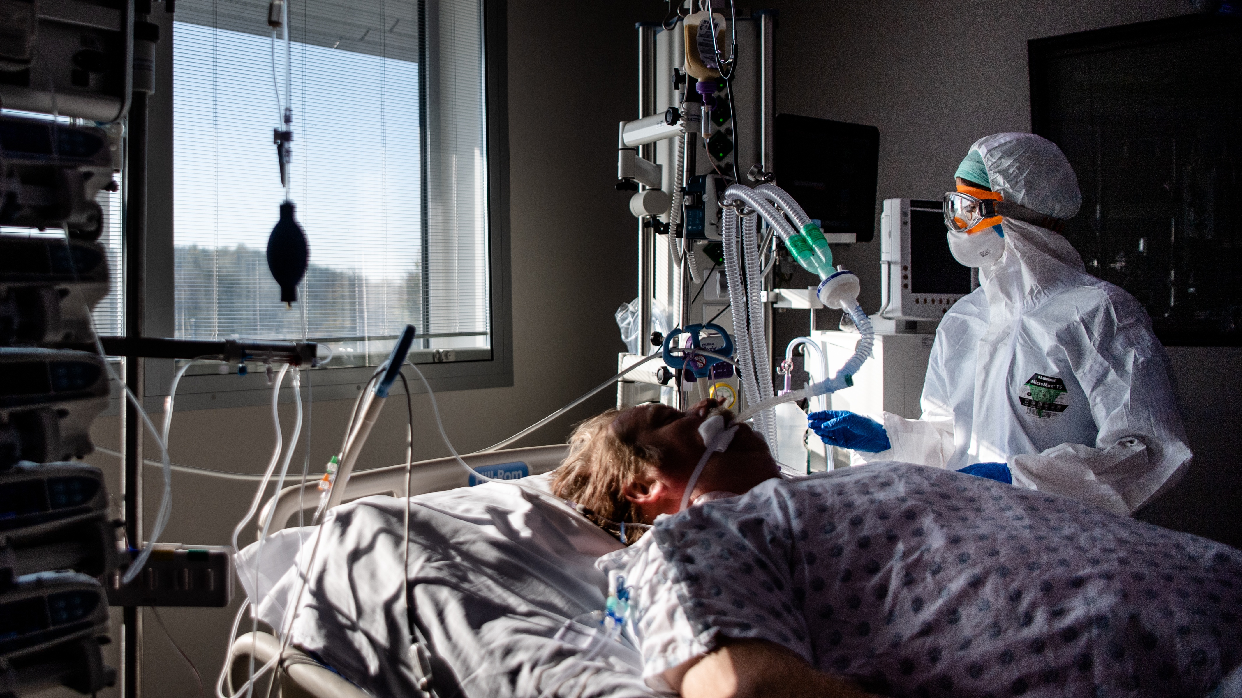 A nurse cares for a ventilated patient at the University Hospital of Charleroi