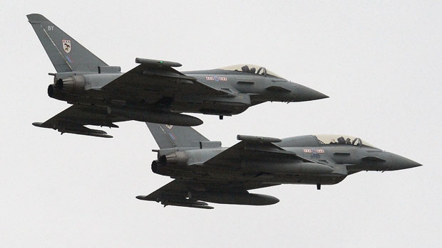 Two RAF Typhoon fighter jets in action