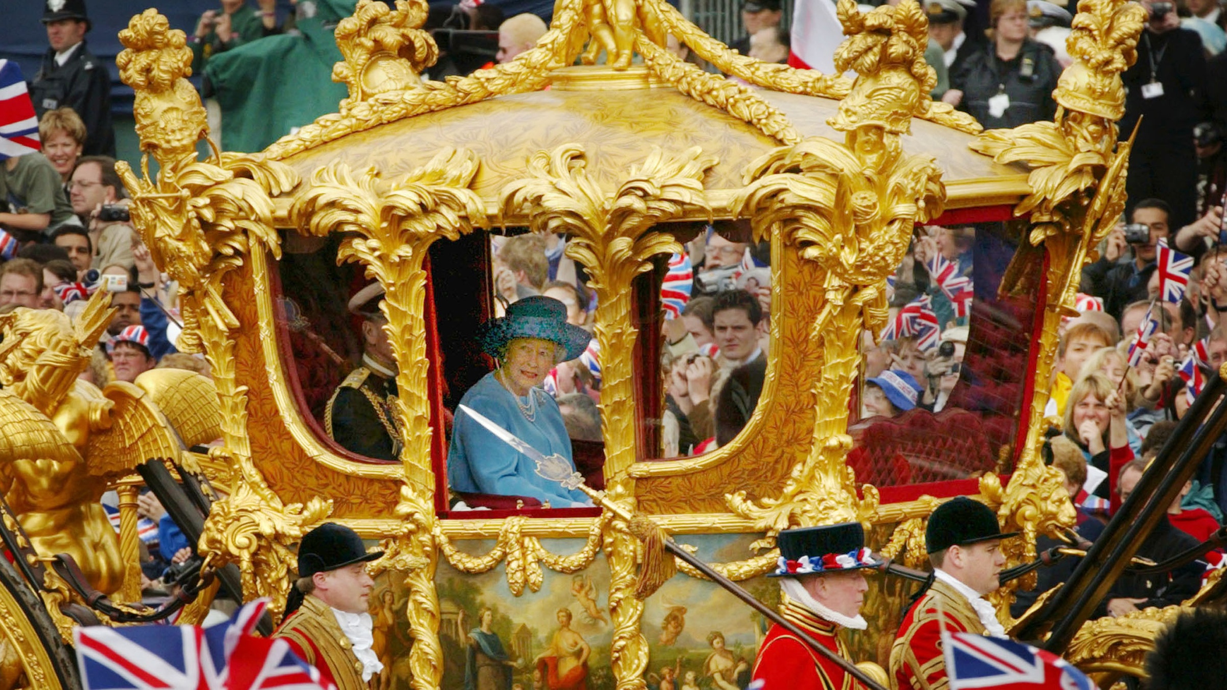 The Queen rides with the Duke of Edinburgh in the Golden State Carriage en route to St Paul’s Cathedral in 2002
