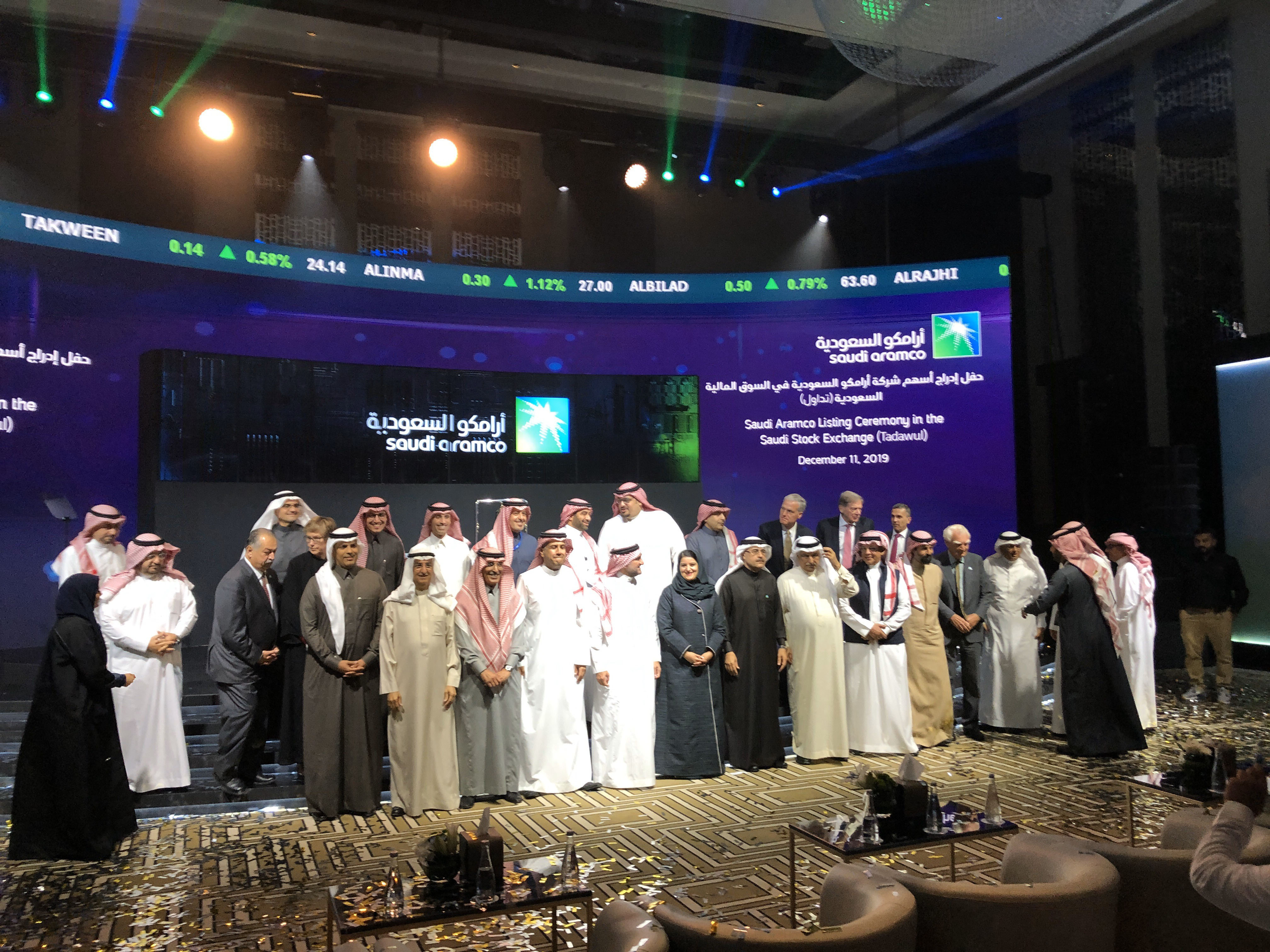 (EDITORS NOTE: Best quality available, image shot using a smartphone.) Participants attend the initial public offering (IPO) of Saudi Aramco at the Fairmont Hotel in Riyadh, Saudi Arabia, on 