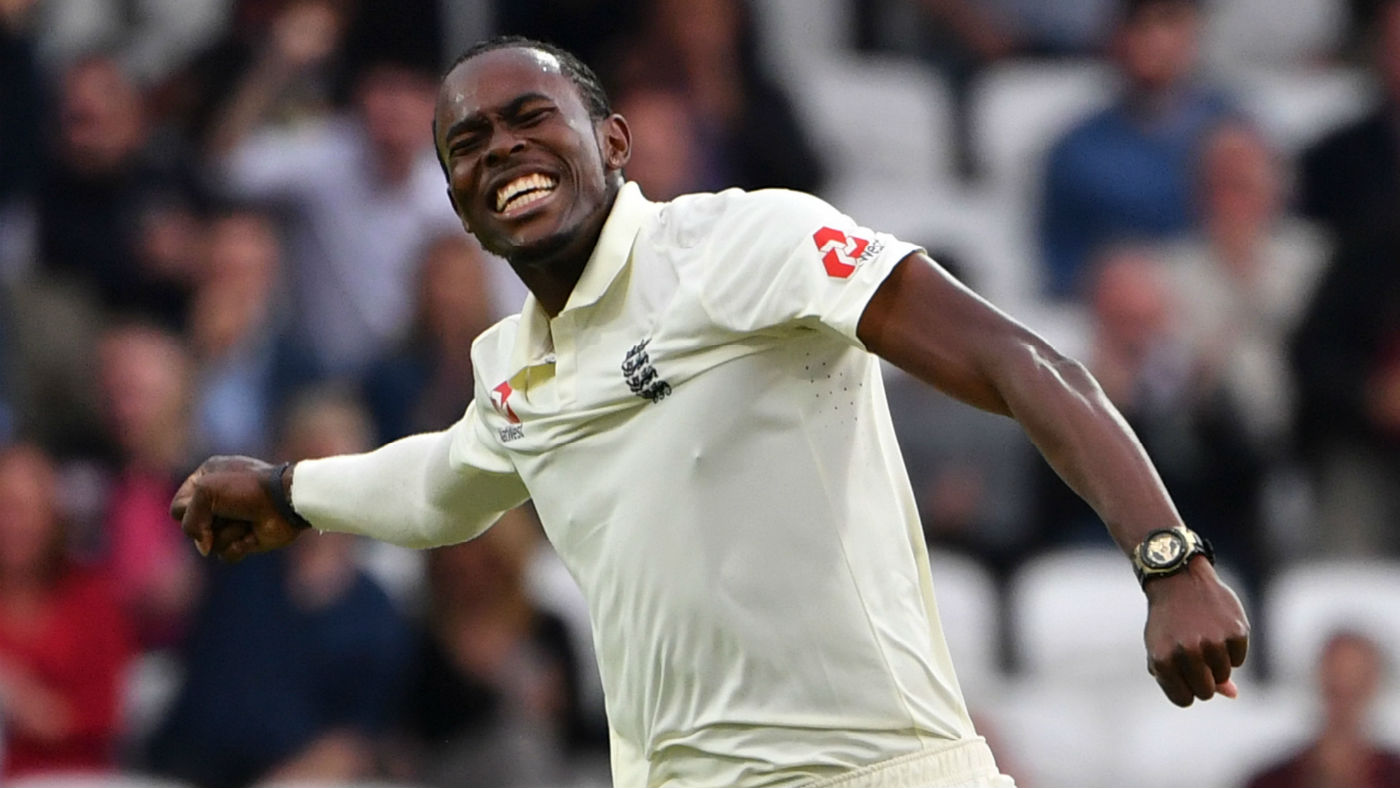 England’s Jofra Archer celebrates taking the wicket of Australia batsman Pat Cummins