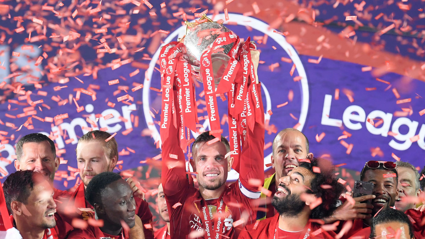 Liverpool captain Jordan Henderson lifts the Premier League trophy 