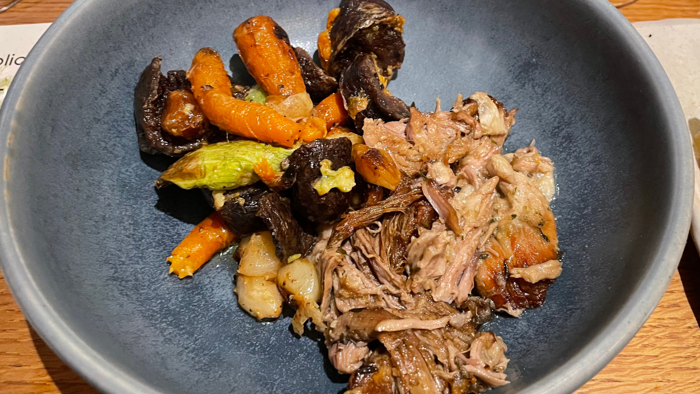 Bowl of braised lamb and vegetables