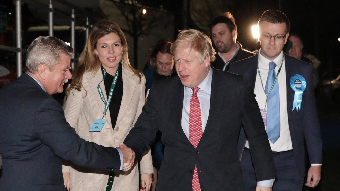 LONDON, ENGLAND - DECEMBER 13: Prime Minister Boris Johnson and his partner Carrie Symonds attend the vote count for his Uxbridge and South Ruislip constituency on December 13, 2019 in Uxbrid