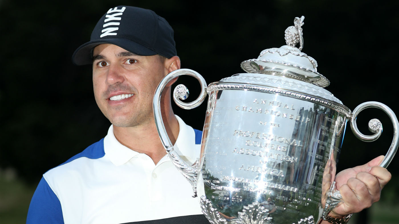 Brooks Koepka poses with the Wanamaker Trophy after winning the 2019 PGA Championship