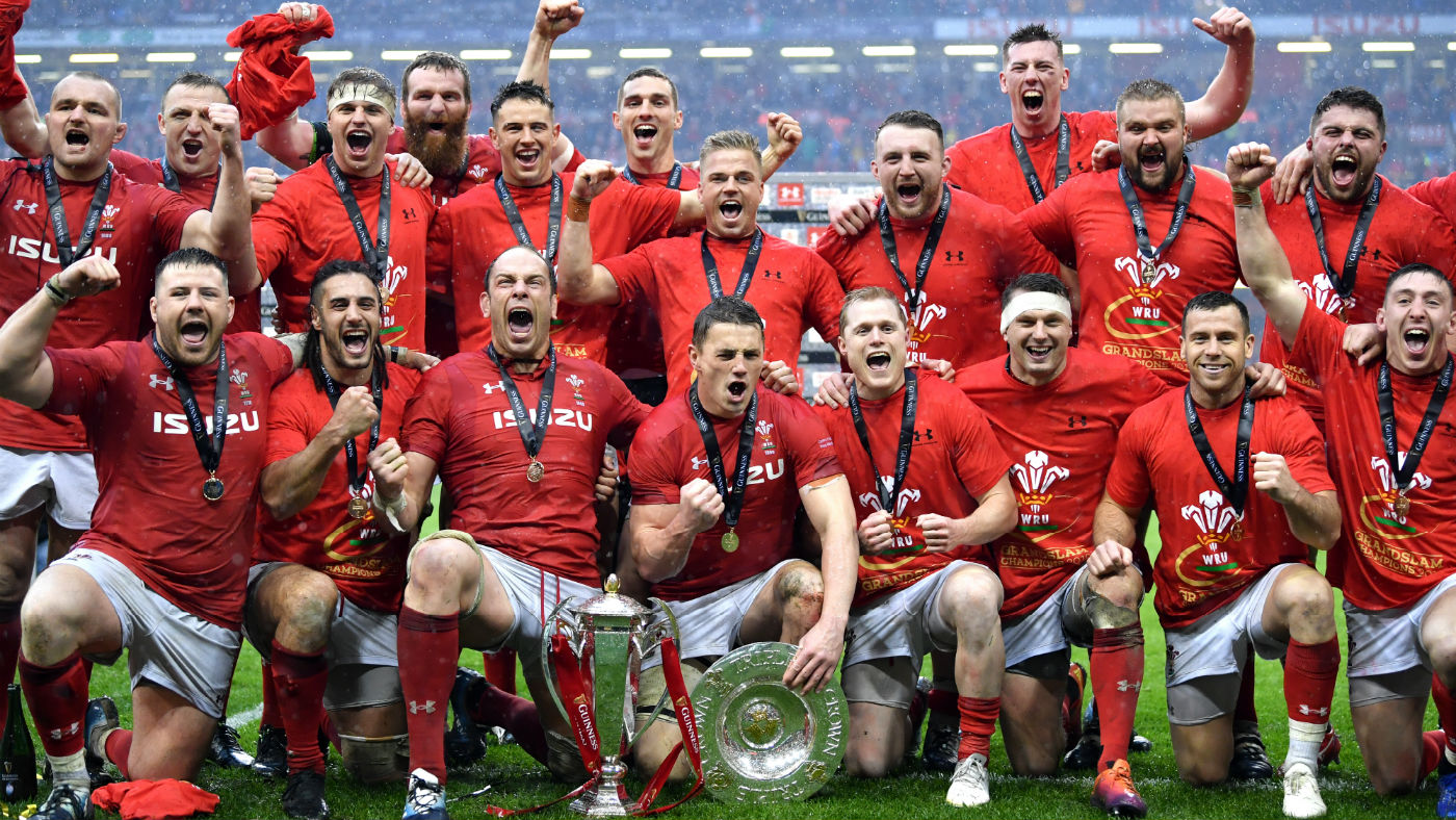 Wales players celebrate winning the 2019 Six Nations, grand slam and triple crown