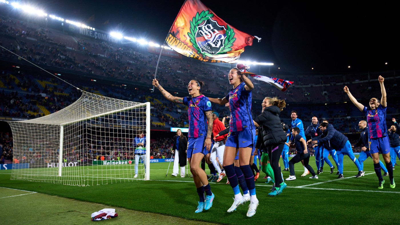 Barcelona players Jennifer Hermoso and Leila Ouahabi celebrate victory over Real Madrid 