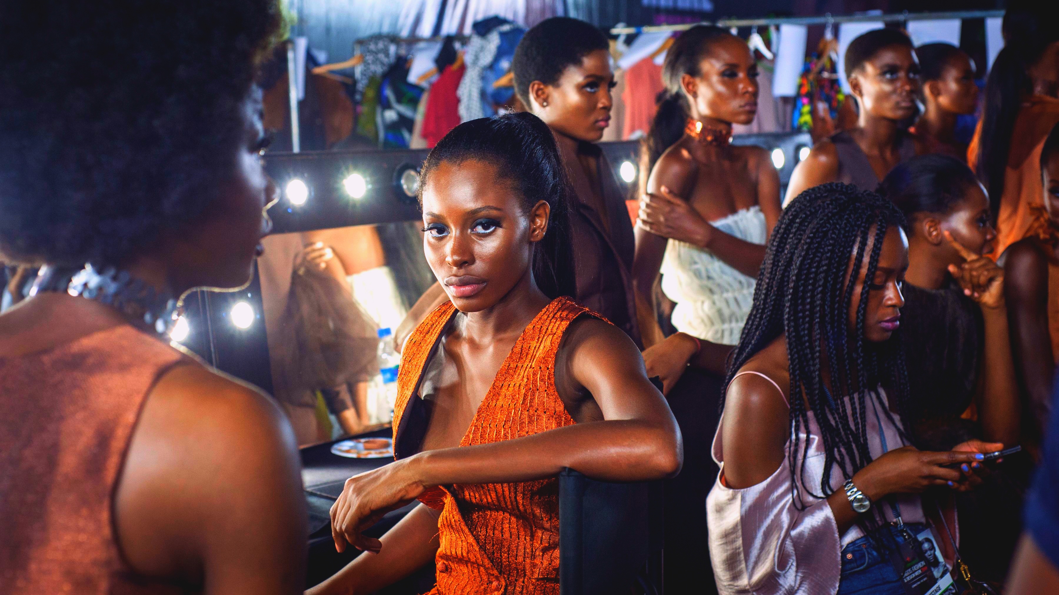 Models get ready backstage at Lagos Fashion and Design Week