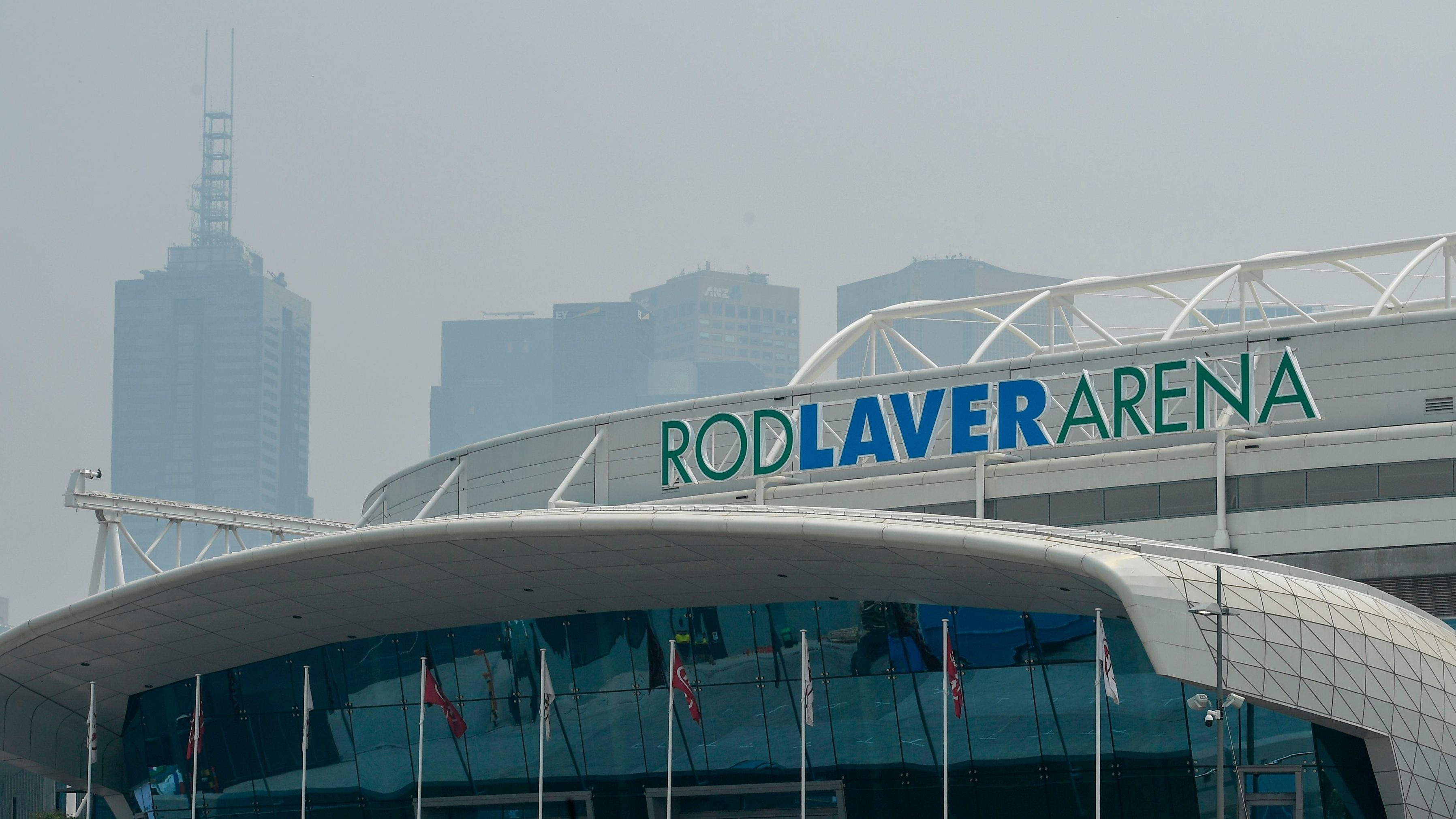 Smoke from the Australian bush fires hangs over the Rod Laver Arena in Melbourne Australian Open