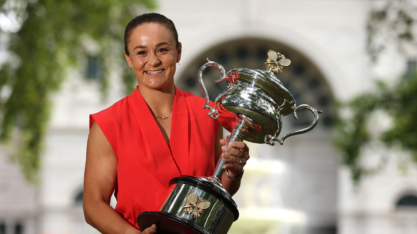 Ash Barty poses with the trophy after winning the 2022 Australian Open   