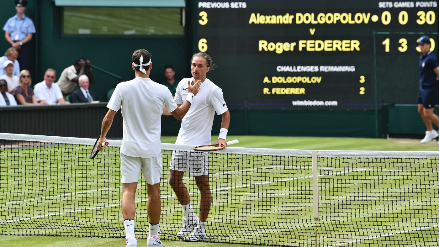 Alexandr Dolgopolov and Roger Federer at Wimbledon