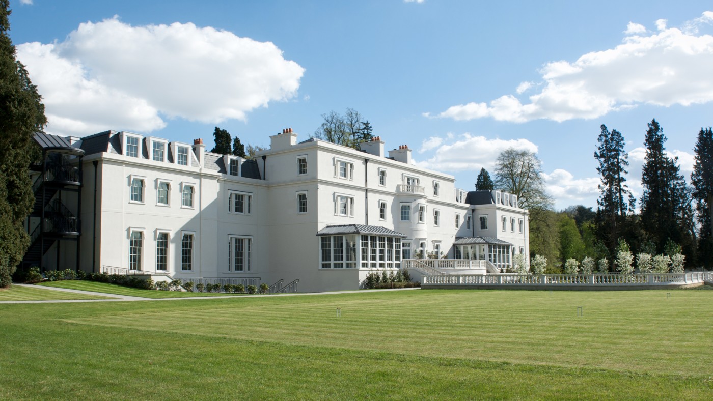 An exterior view of Coworth Park from the croquet lawn