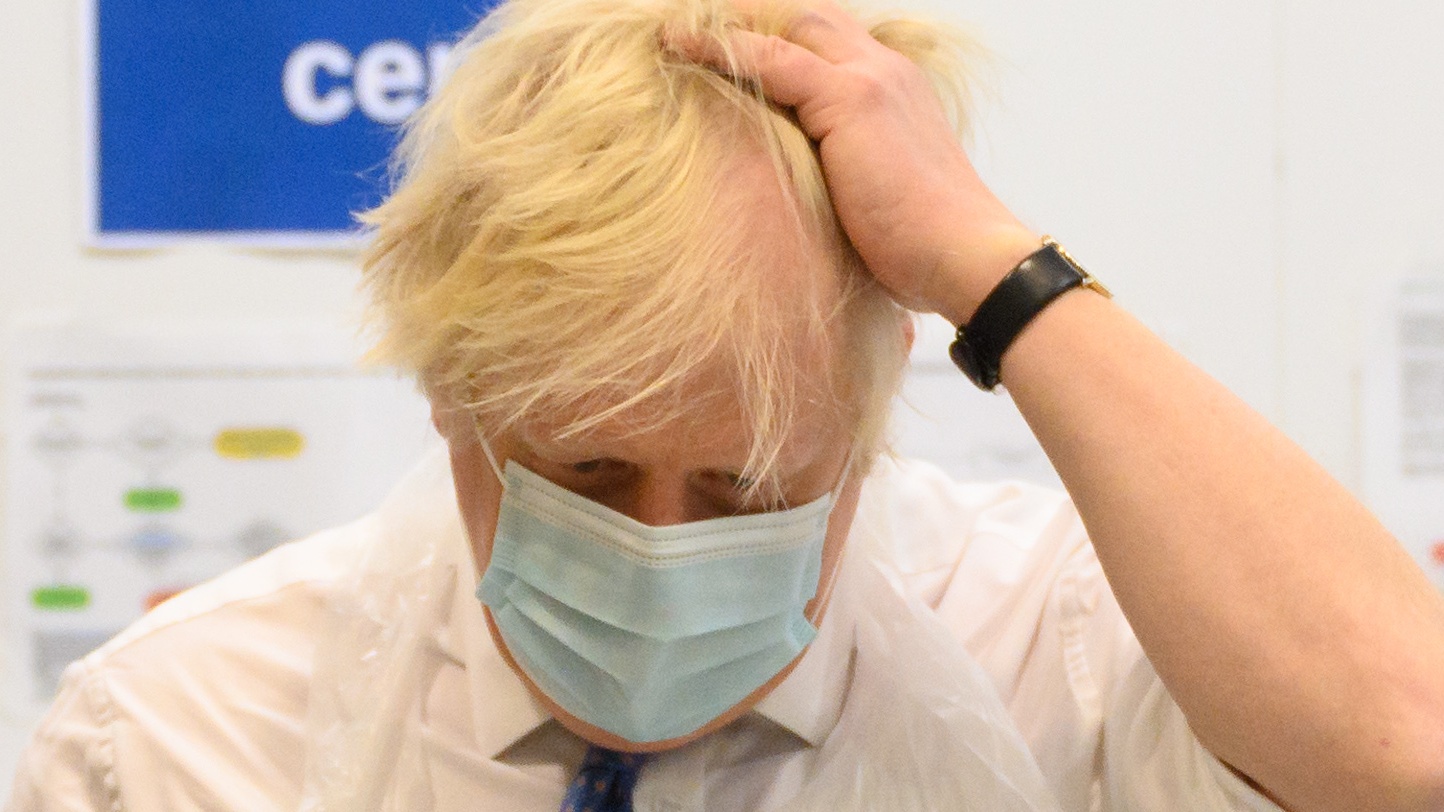 Boris Johnson during a visit to a vaccination centre in London