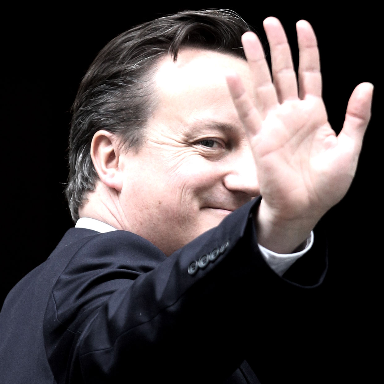 LONDON, ENGLAND - MAY 10:British Prime Minister David Cameron waves as he enters Number 10 Downing Street on May 10, 2012 in London, England. Andy Coulson, a former editor of the News of the 