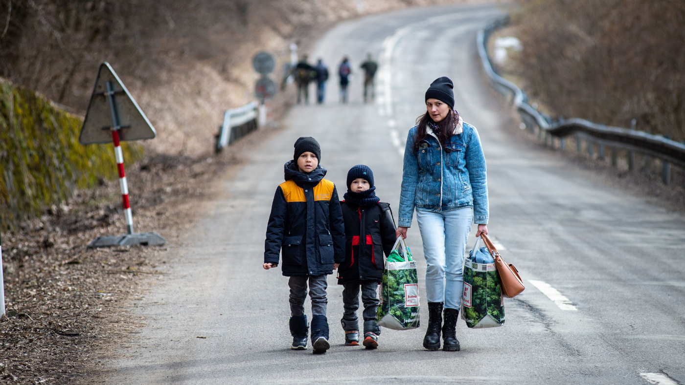 A family flee Ukraine