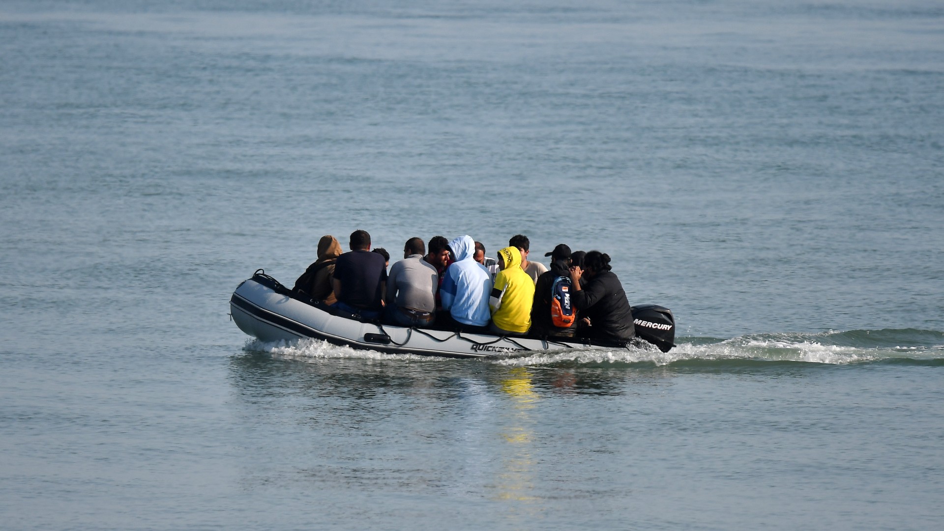 Migrants in inflatable boat 