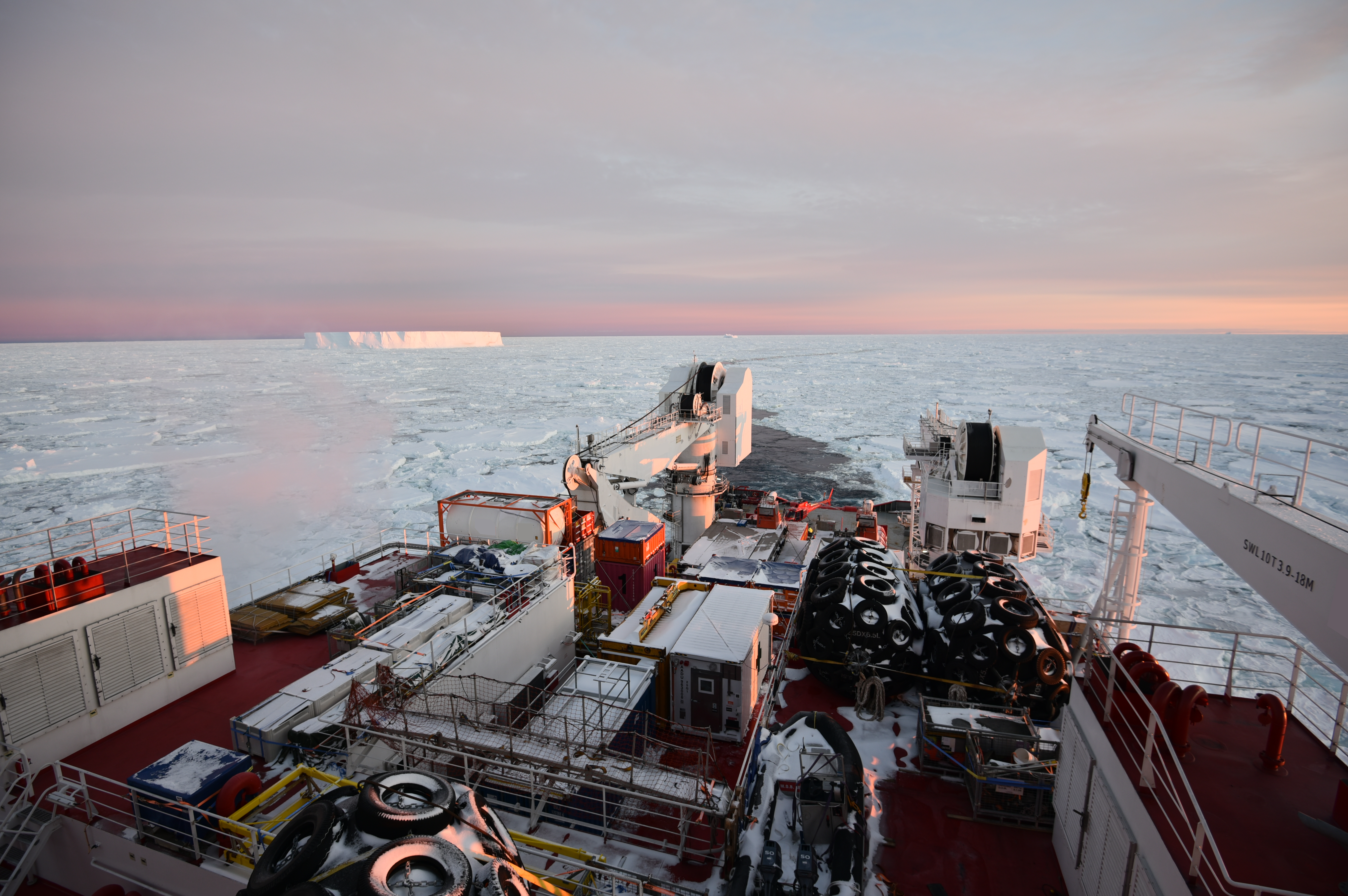 An icebreaker cuts through a sea of ice, Southern Ocean, Antarctica