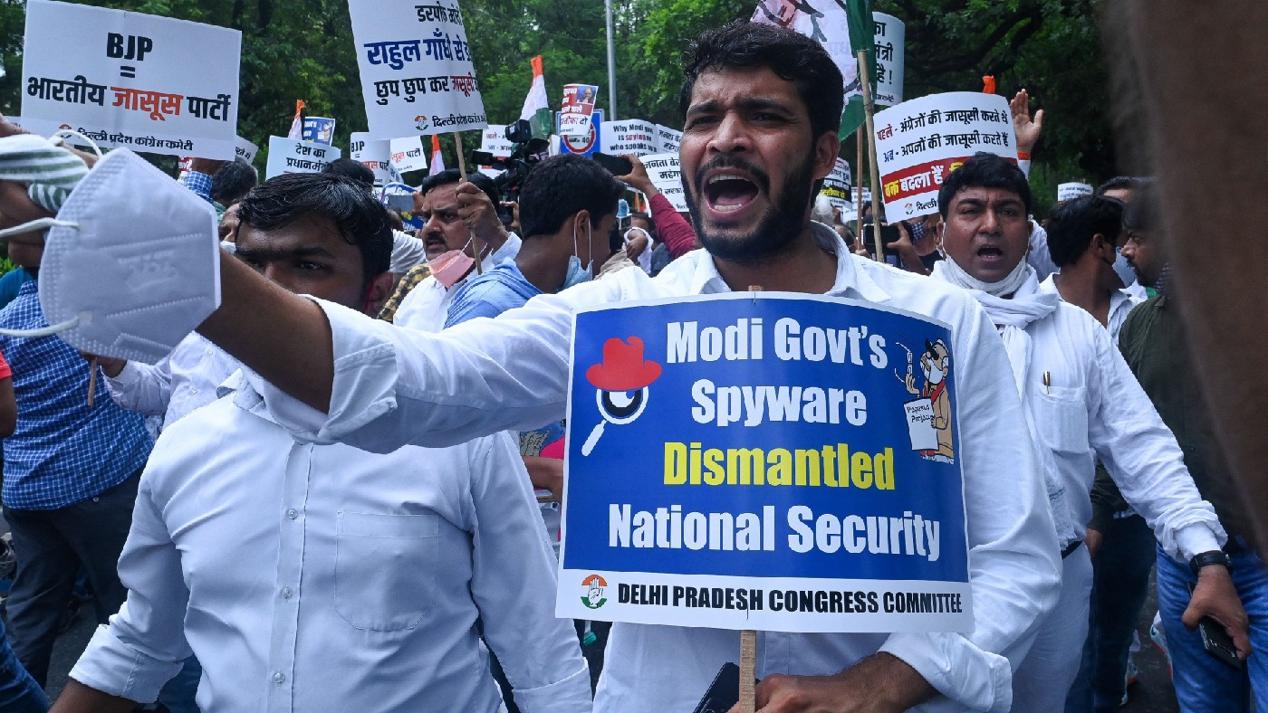 People in New Delhi demonstrating with placards 