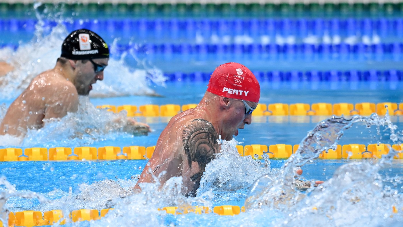 Adam Peaty defended his Olympic 100m breaststroke title