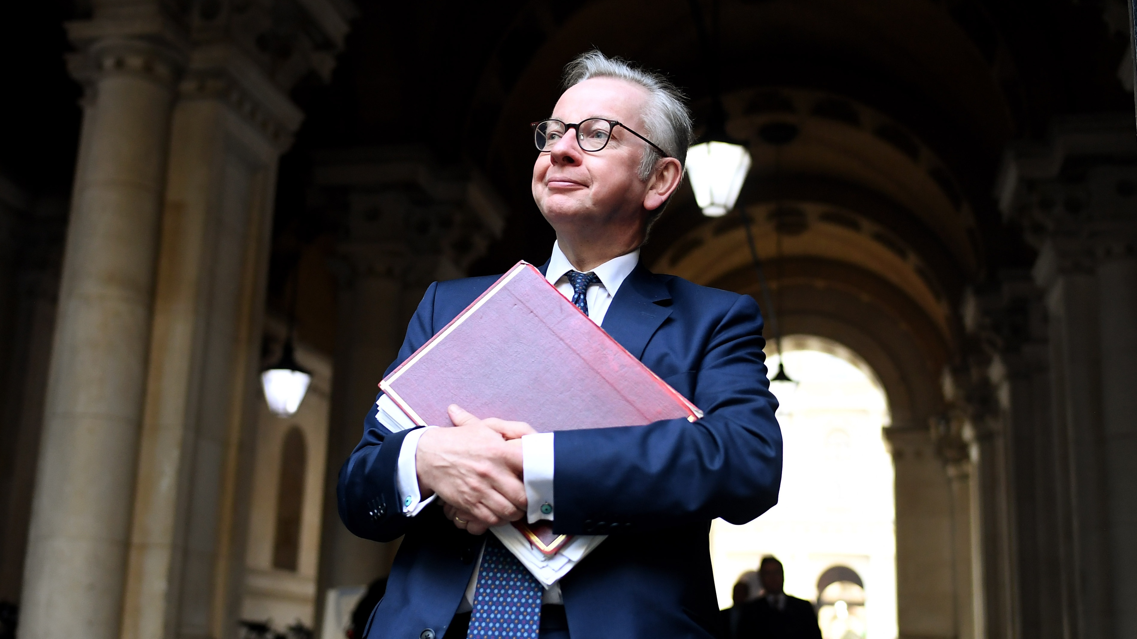 Michael Gove walks to Downing Street after attending a cabinet meeting