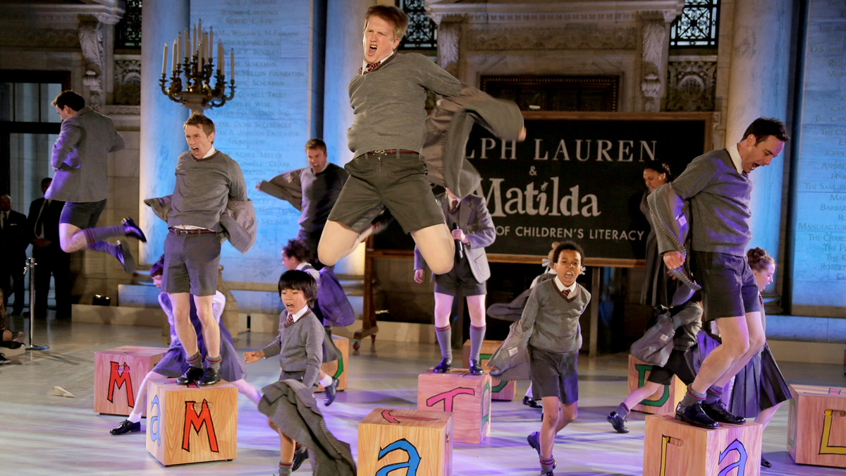 NEW YORK, NY - MAY 19:The cast of Matilda perform at the Ralph Lauren Fall 14 Children&#039;s Fashion Show in Support of Literacy at New York Public Library on May 19, 2014 in New York City.(Photo