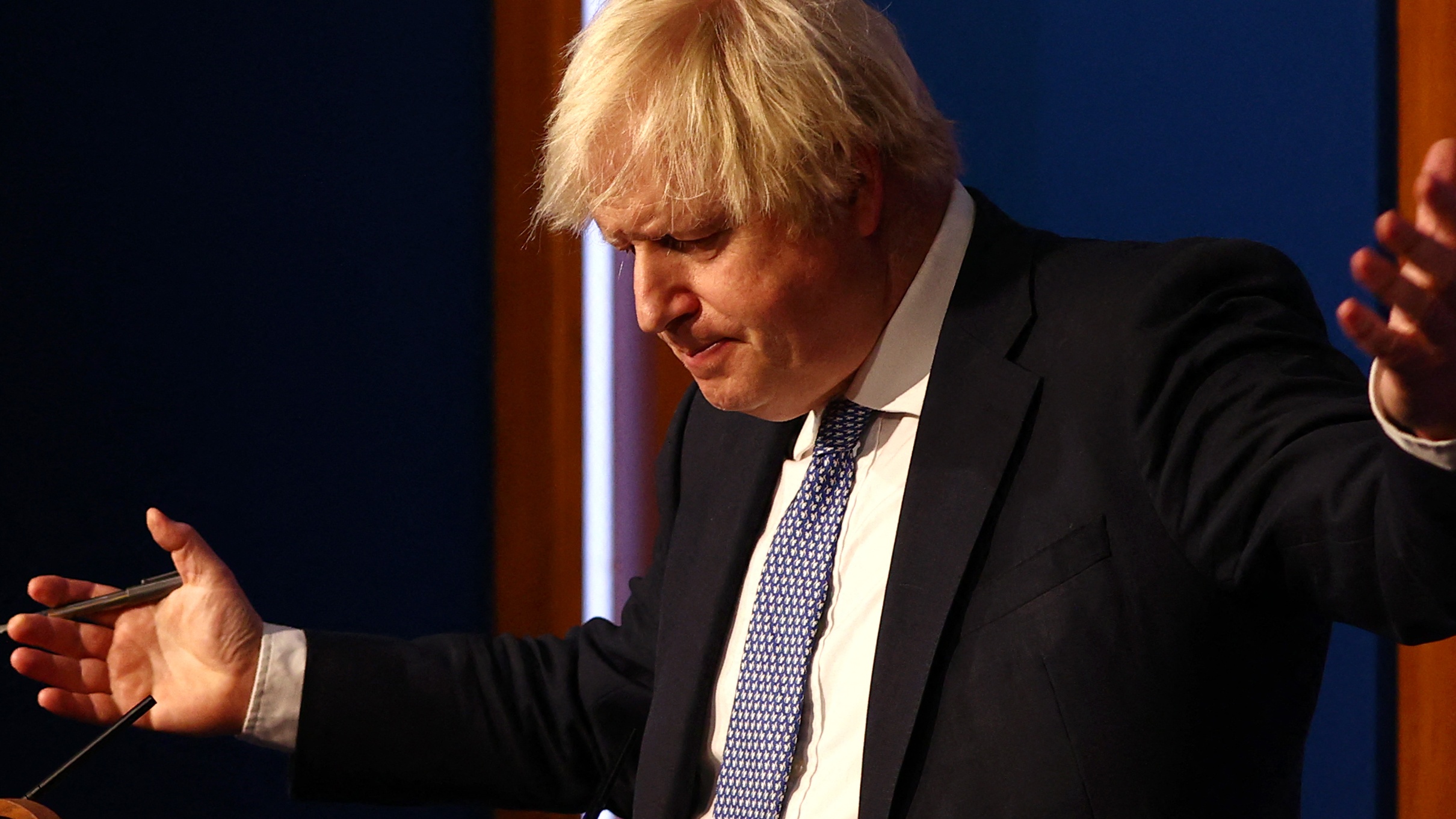 Boris Johnson gestures during a No. 10 press conference