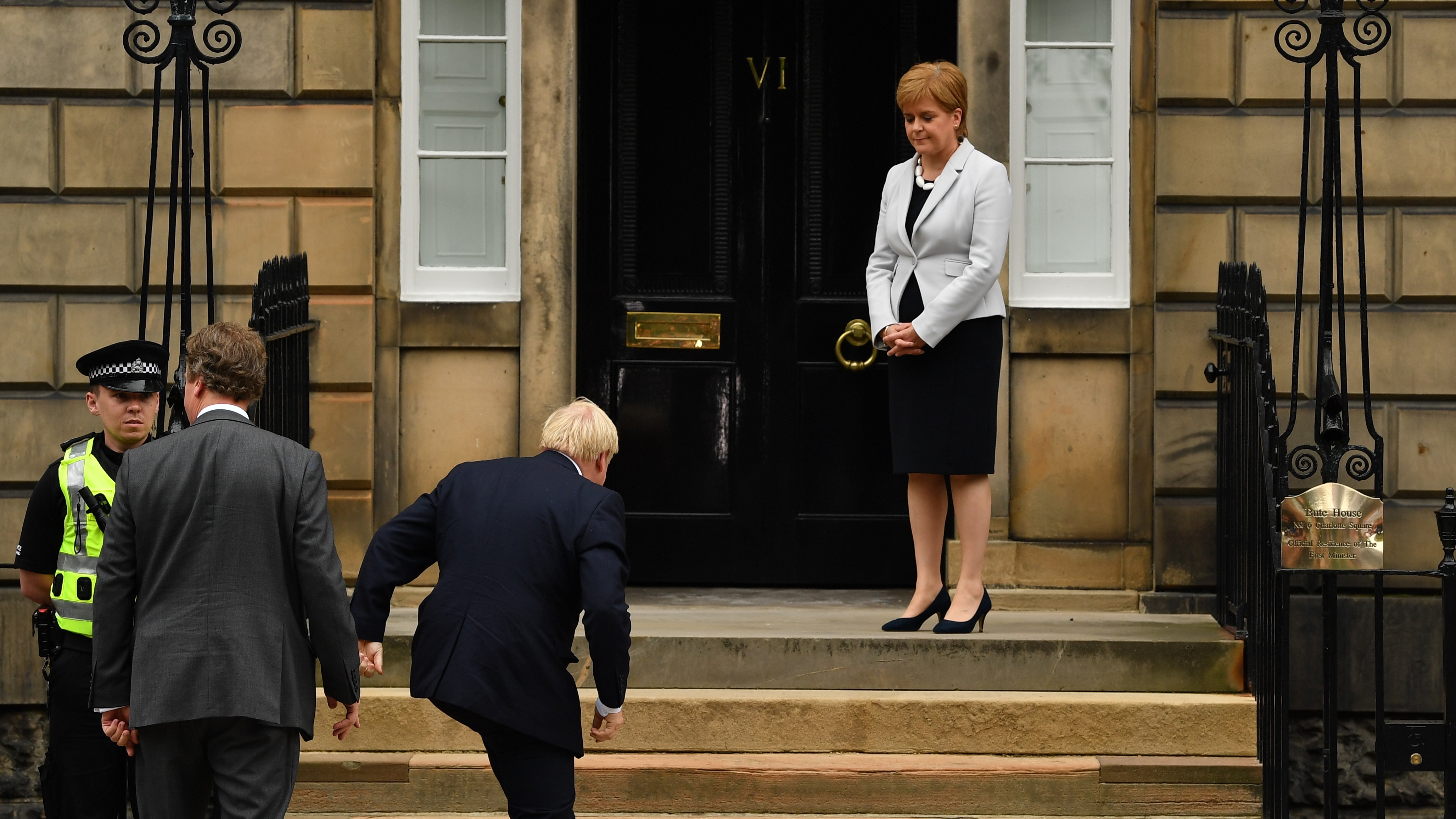 Nicola Sturgeon welcomes Boris Johnson outside Bute House
