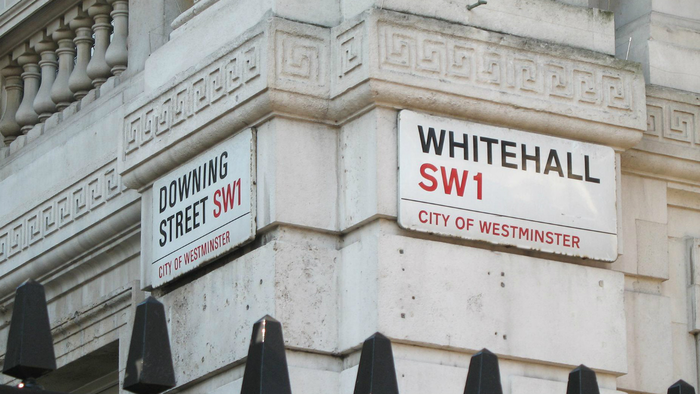 Street-name signs for Whitehall and Downing Street