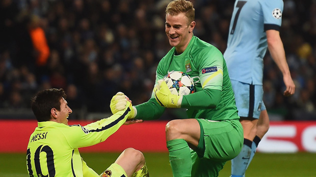 Joe Hart of Manchester City and Lionel Messi of Barcelona