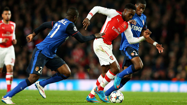 Danny Welbeck of Arsenal is tackled by Monaco players 