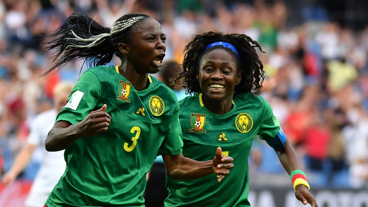 Ajara Nchout (left) celebrates her winner against New Zealand with Cameroon team-mate Gabrielle Onguene