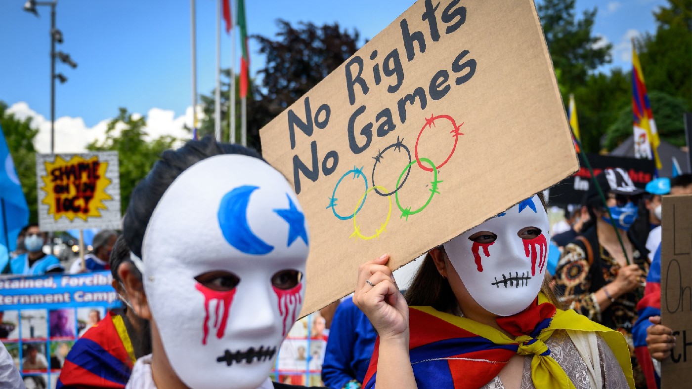 Tibetan and Uyghur activists protest against the 2022 Winter Olympics in front of the Olympic Museum in Lausanne Switzerland, on 23 June 2021