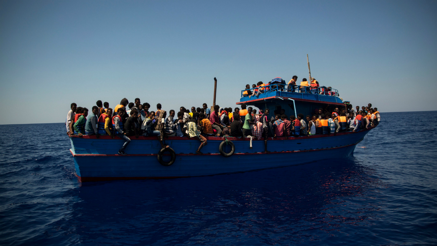 Migrants wait to be rescued by the Aquarius NGO rescue ship in the Mediterranean Sea