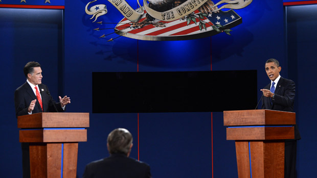 US President Barack Obama (R) and Republican presidential candidate Mitt Romney (L) participate in the first presidential debate at Magness Arena at the University of Denver in Denver, Colora