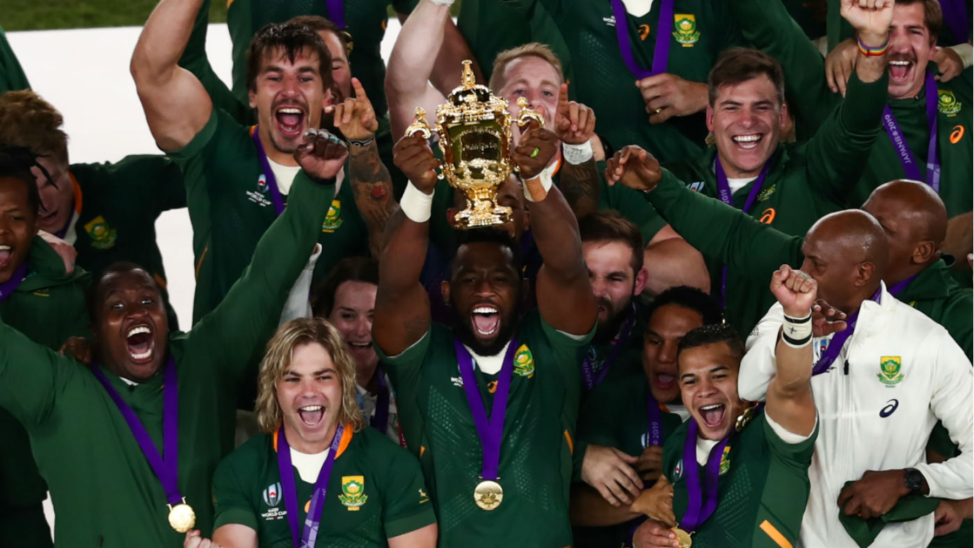 South Africa captain Siya Kolisi lifts the Webb Ellis Cup after the win against England