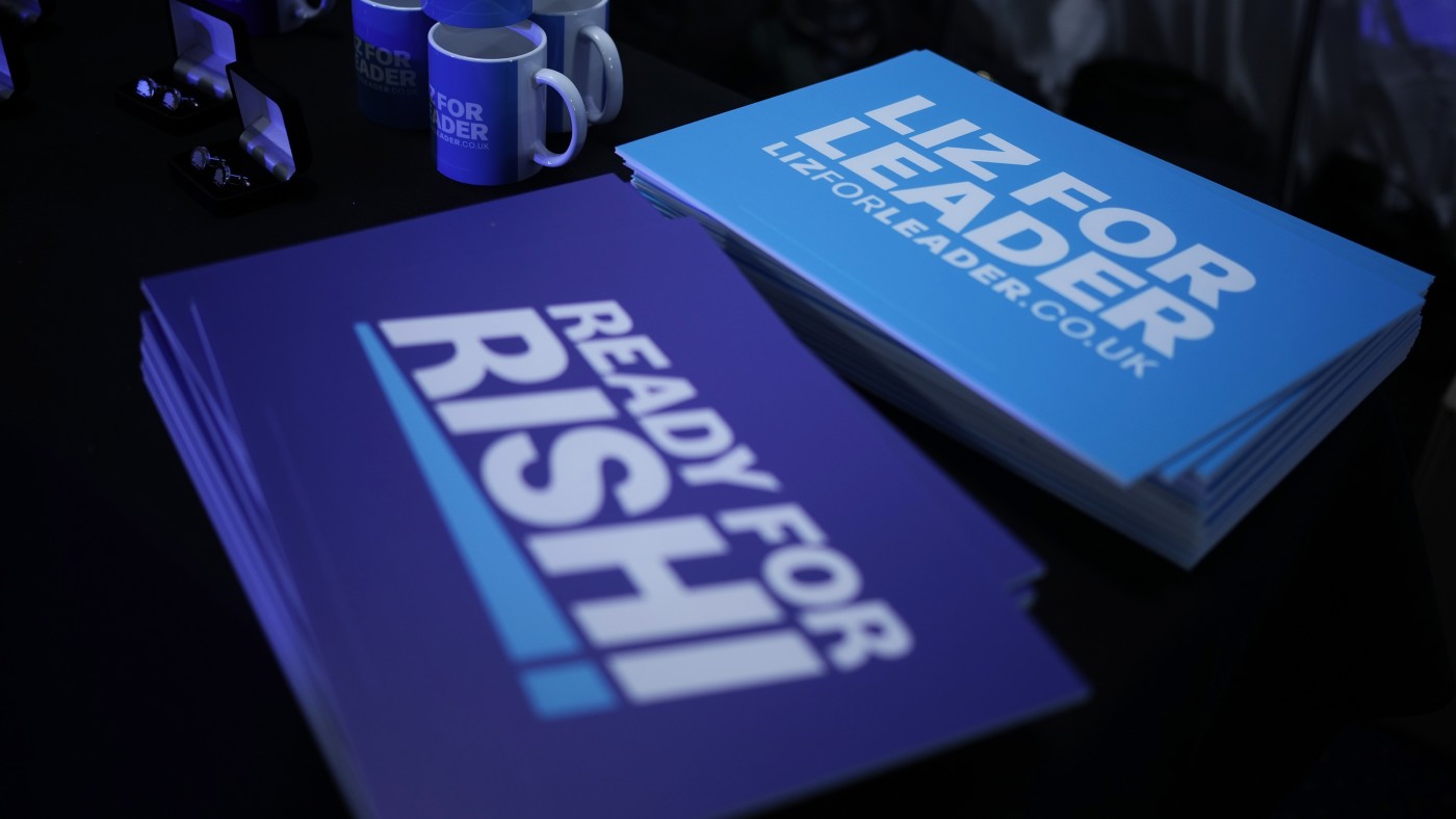 Campaign mugs and signs for Rishi Sunak and Liz Truss