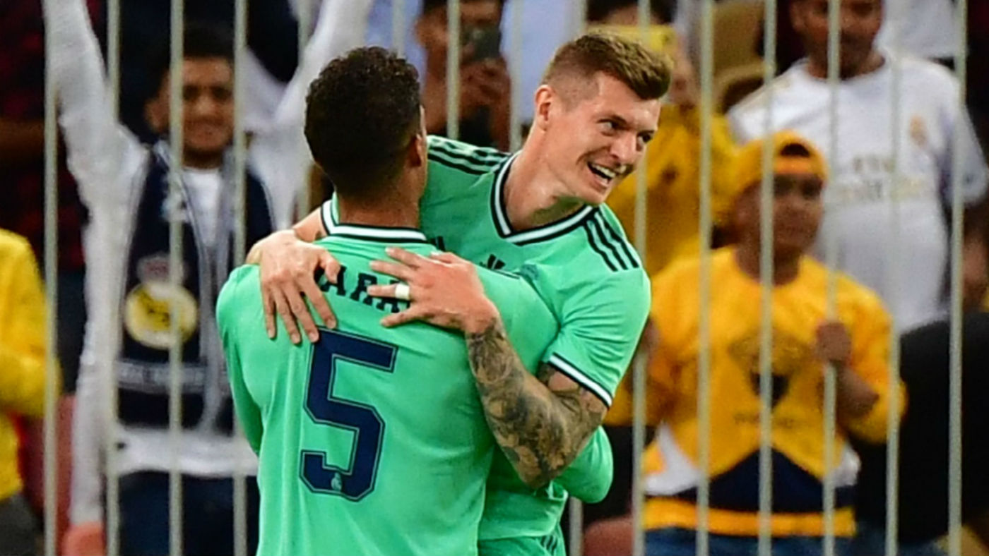 Toni Kroos celebrates his goal with Real Madrid team-mate Raphael Varane