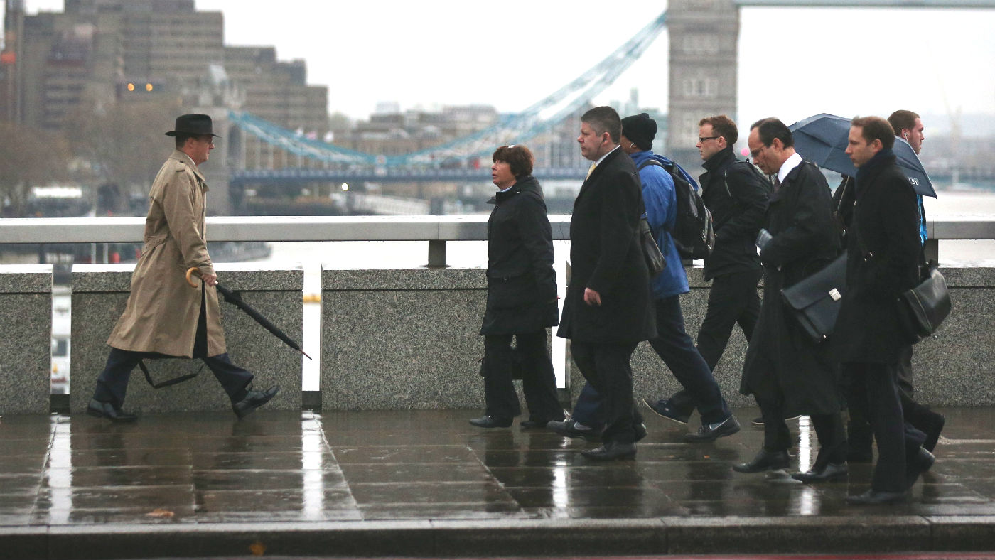 City workers crossing London Bridge