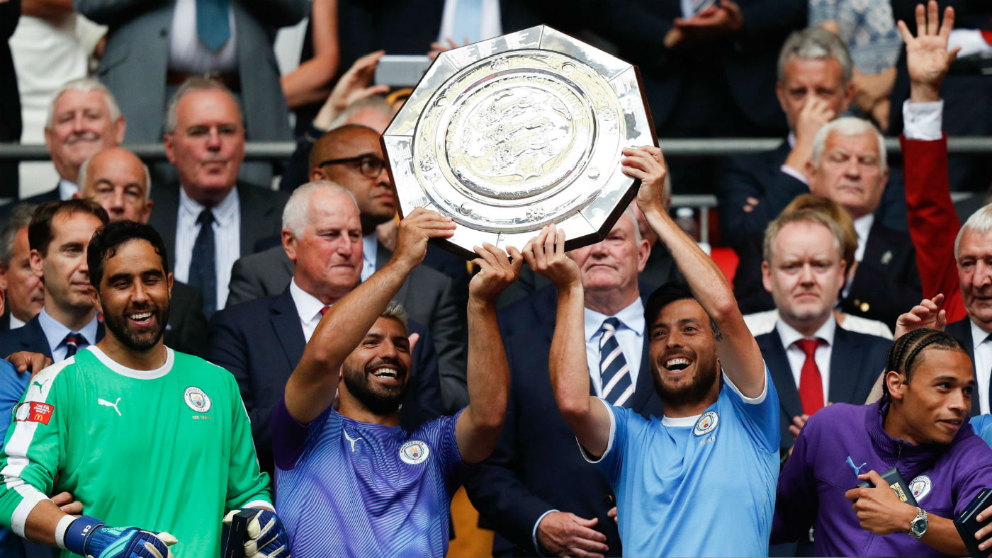 Manchester City’s Sergio Aguero and David Silva lift the FA Community Shield at Wembley