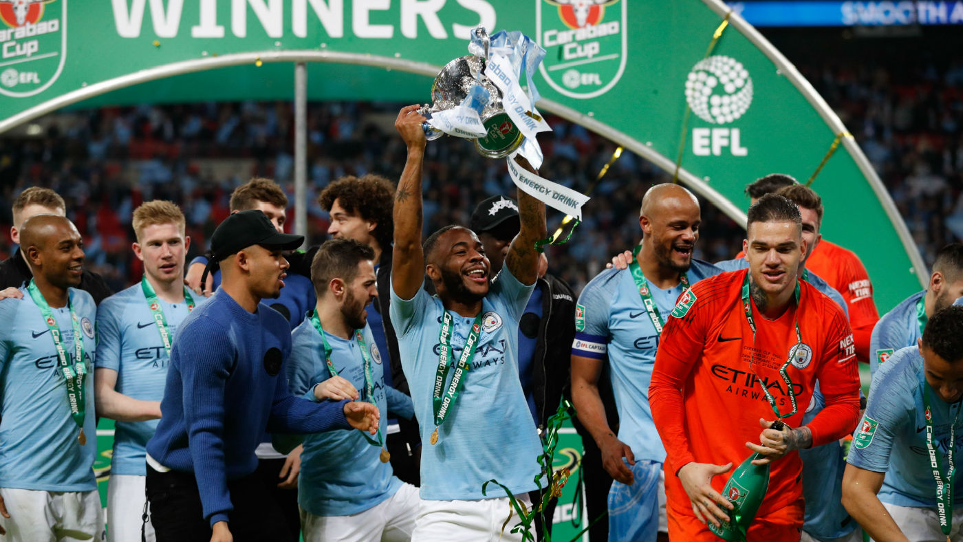 Manchester City forward Raheem Sterling celebrates after the Carabao Cup final win against Chelsea