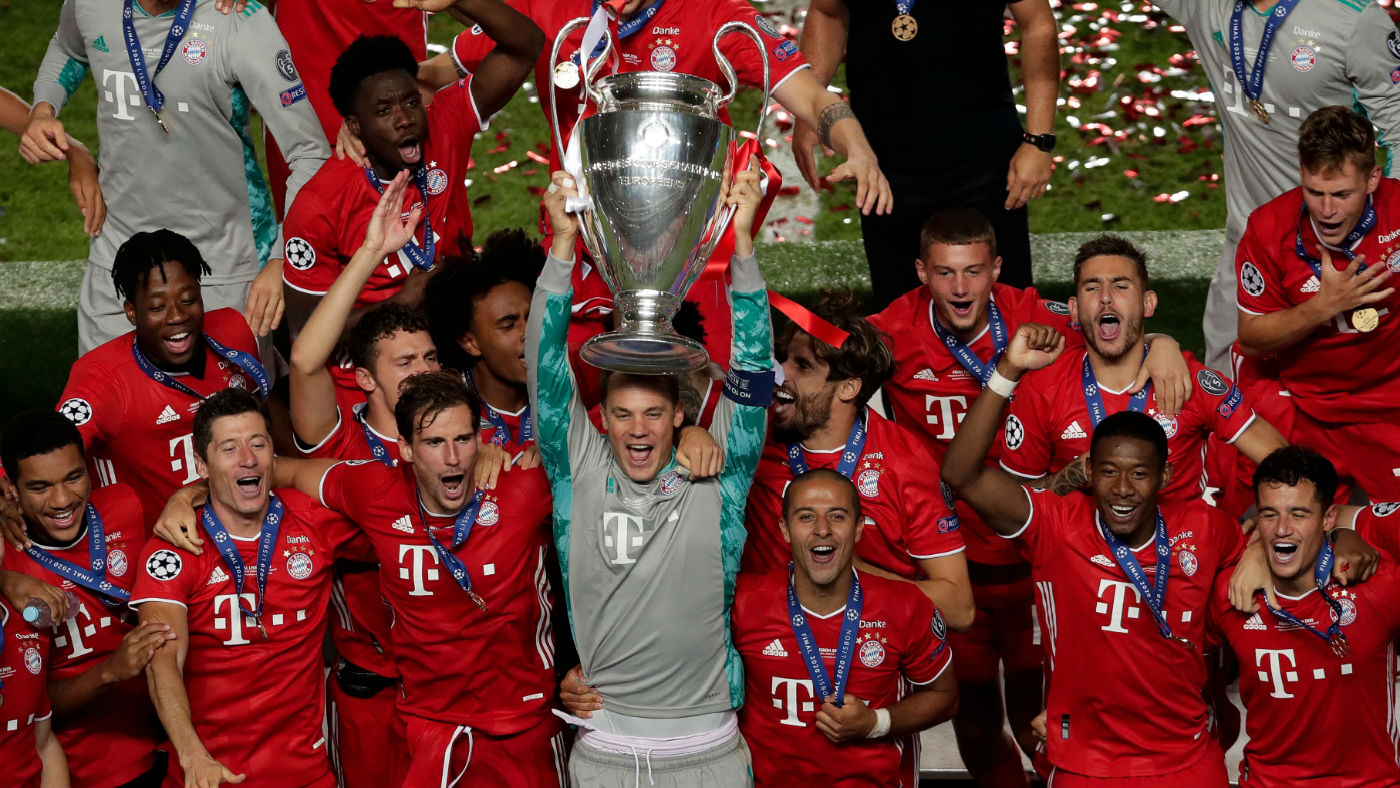 Bayern Munich captain Manuel Neuer lifts the Uefa Champions League trophy