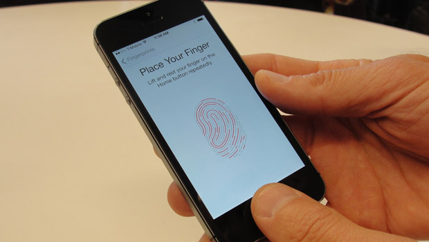 New iPhone 5S handsets let people use their fingerprints to unlock the smartphones at an iPhone event at Apple&#039;s headquarters in Silicon Valley on September 10, 2013 in Cupertino, California.