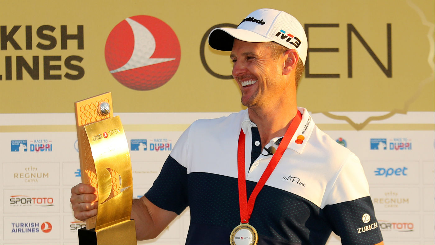 Justin Rose holds the trophy after his win at the Turkish Airlines Open