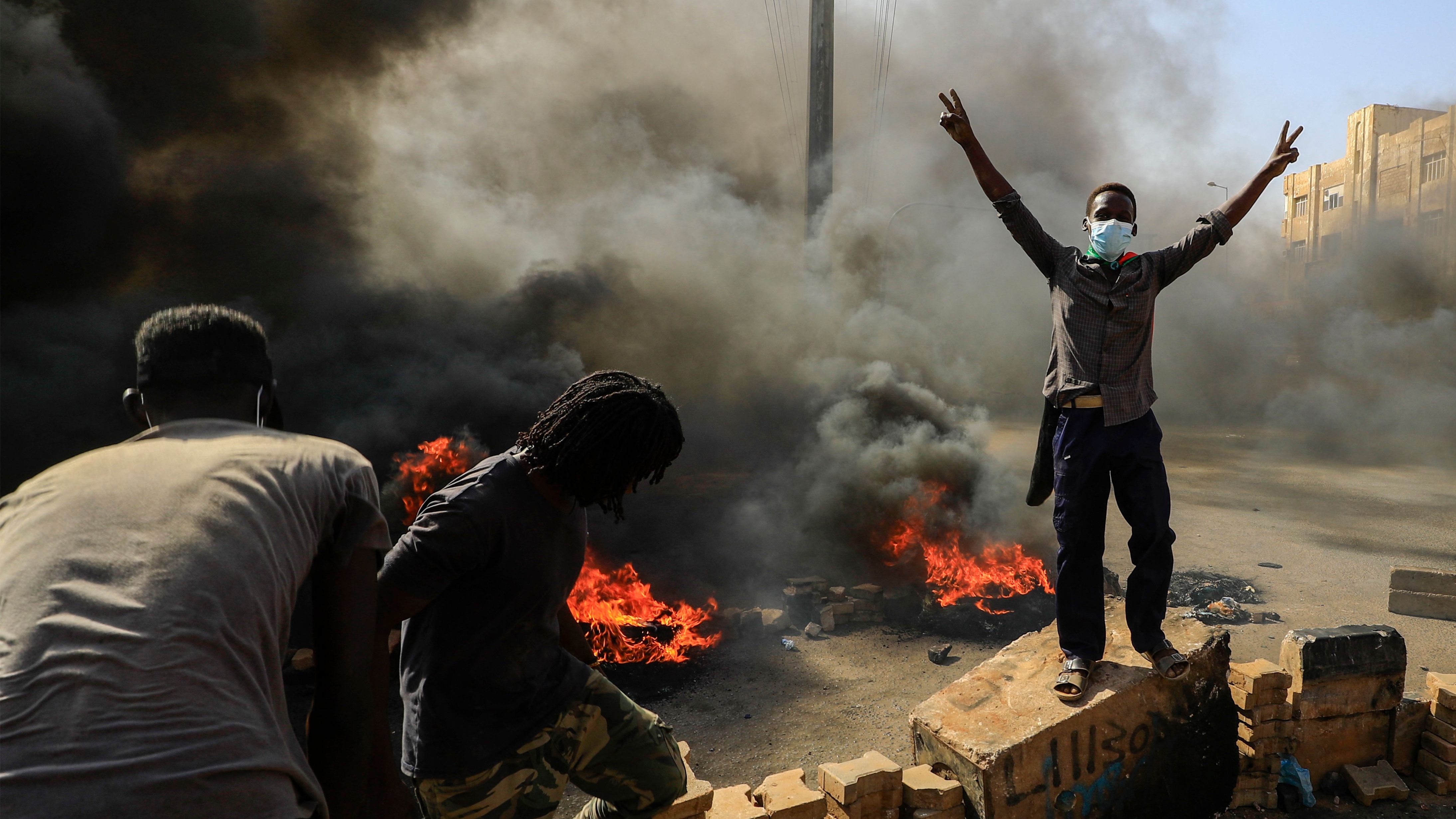 Protestors block a road in the Sudanese capital city Khartoum