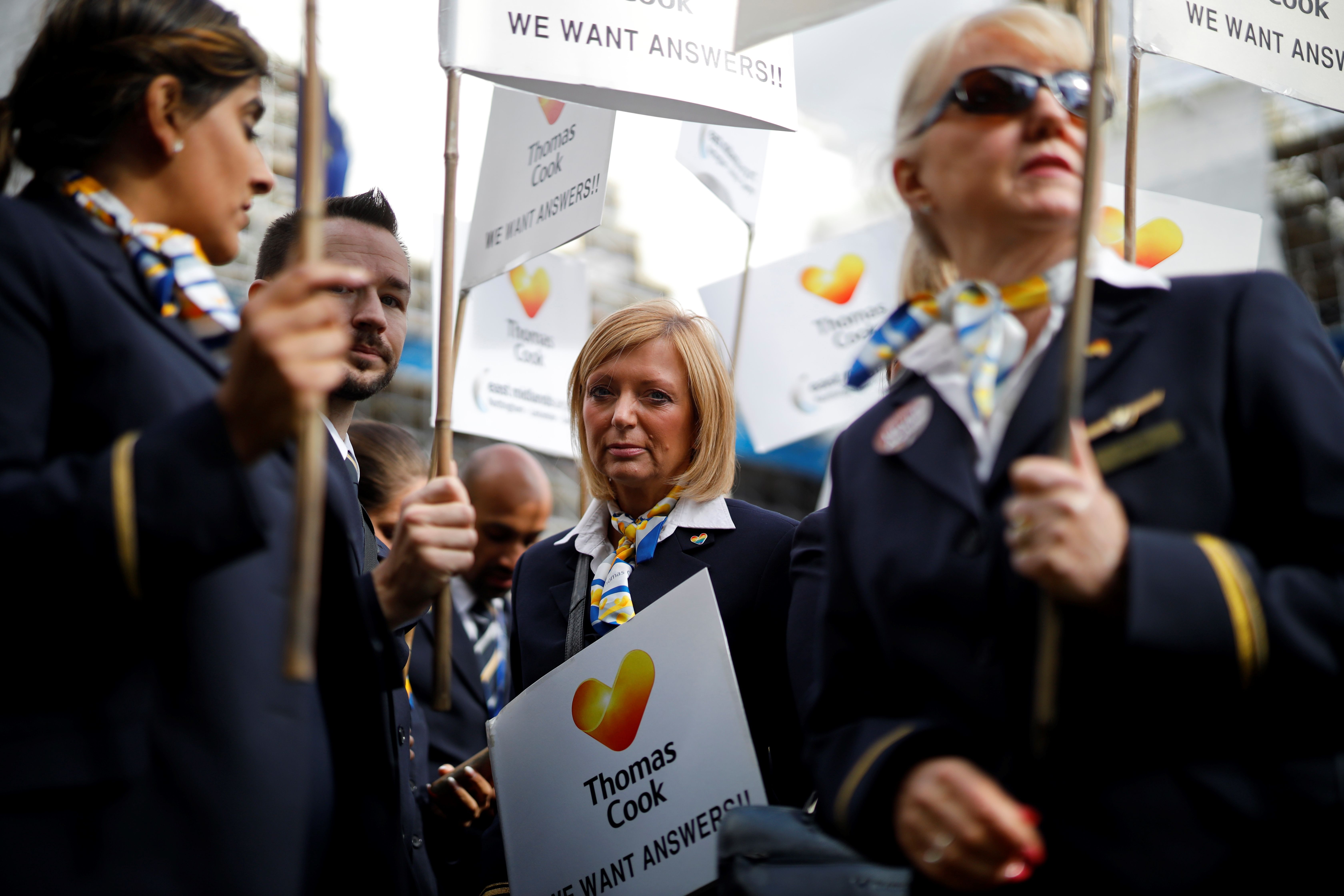 Ex-Thomas Cook employees demonstrate in London on October 2, 2019, after delivering a petition calling for a full inquiry into Thomas Cook&#039;s collapse and for the company&#039;s directors to pay ba