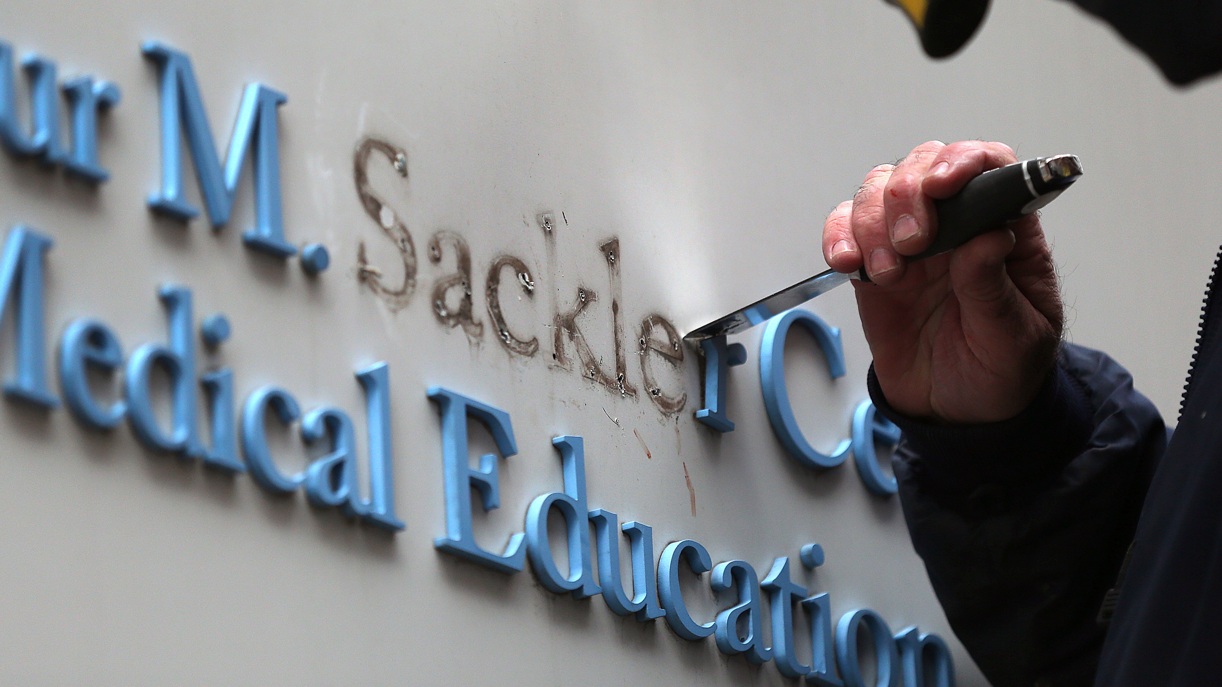 Sackler family name is removed from building at Tufts University
