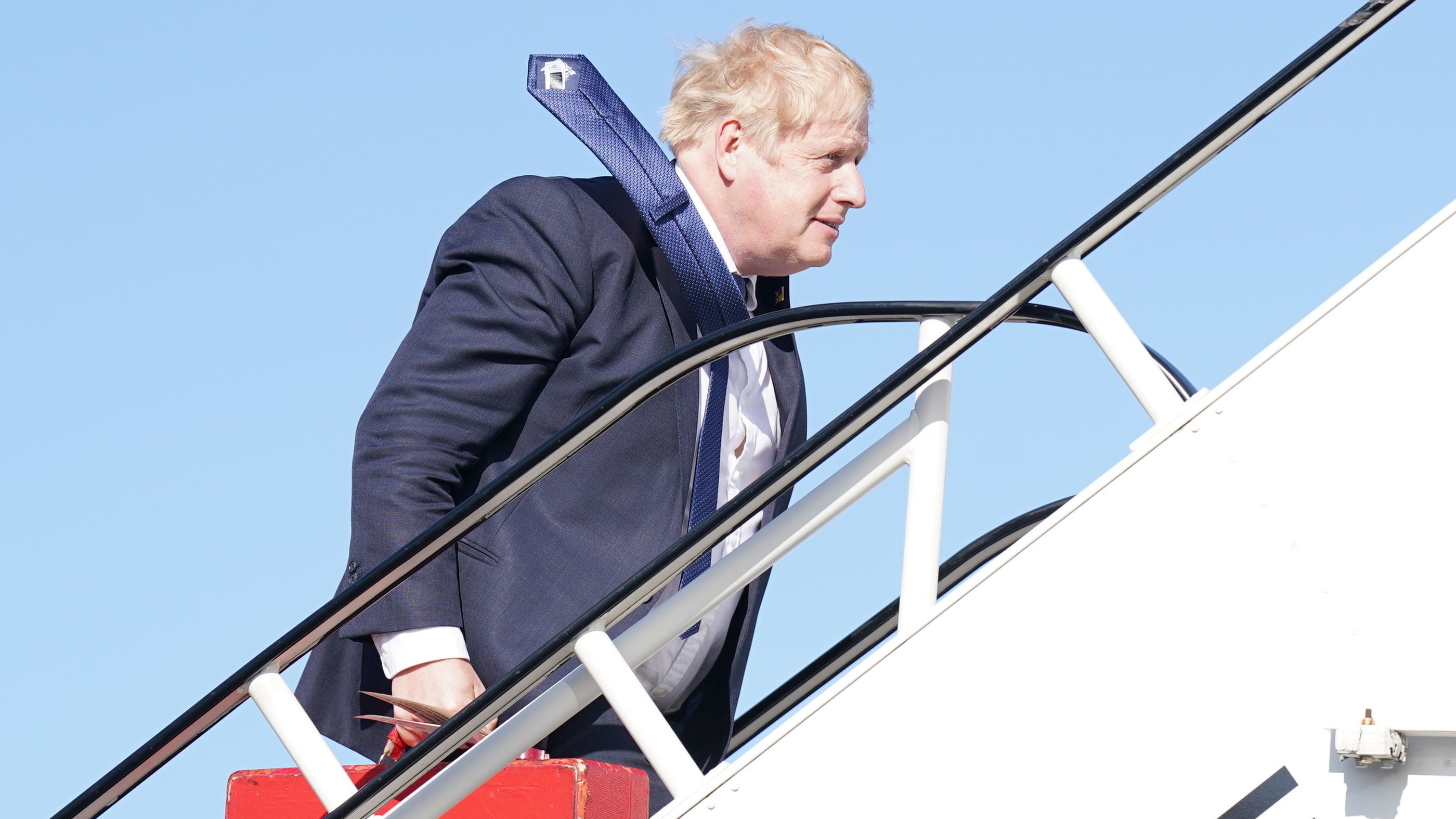 Boris Johnson boards a plane to India