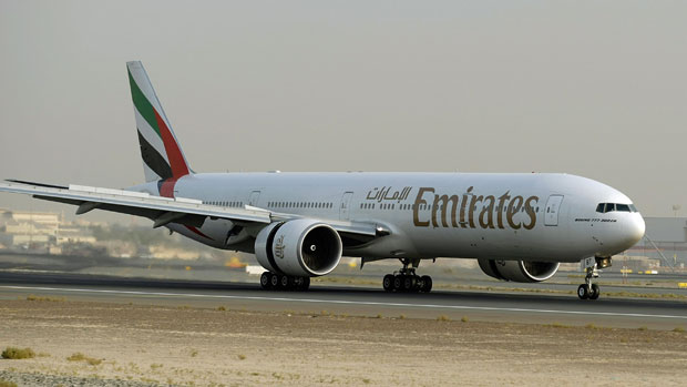 An Emirates plane readies for take-off at Dubai airport 